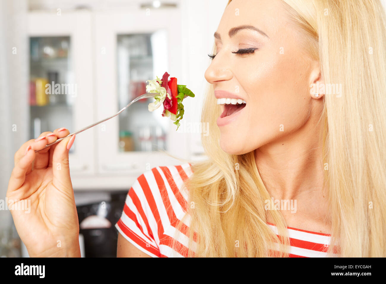 Attractive Woman Eating Meal Hi res Stock Photography And Images Alamy
