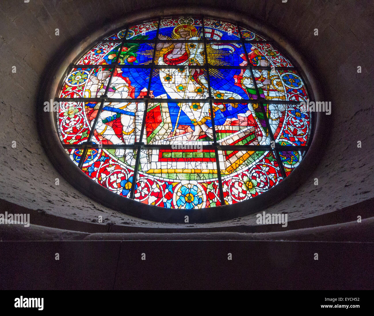 Circular stained glass window in drum of the dome of Florence Cathedral. Italy. Florence, Italy. Stock Photo