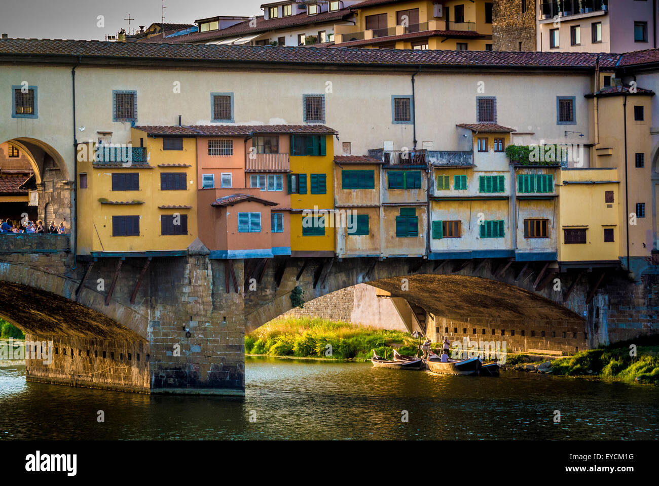 Rear view of shops along the Ponte Vecchio crossing the river Arno. Florence, Italy. Stock Photo