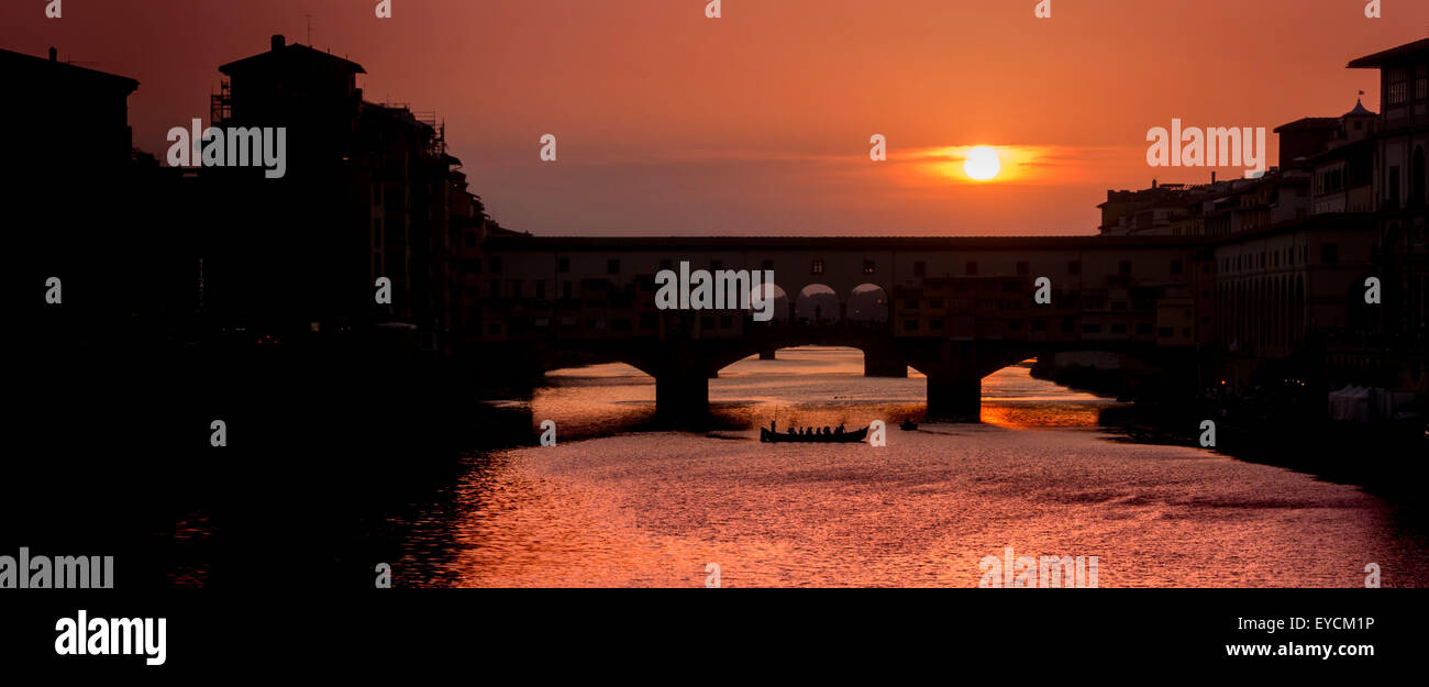 Ponte Vecchio at sunset and the river Arno. Florence, Italy. Stock Photo