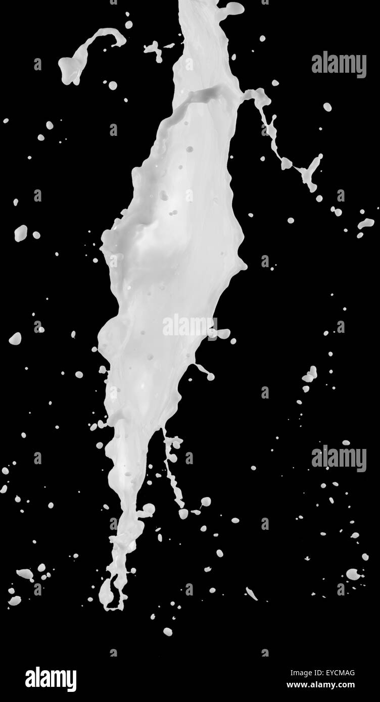 milk splash isolated on the black background Stock Photo - Alamy