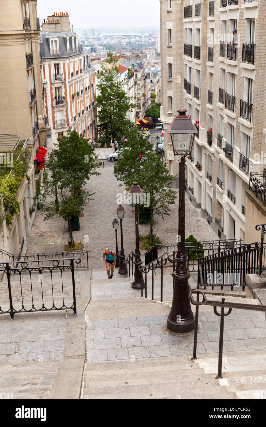 View down the steep steps at Rue du Mont Cenis towards the North of Montmartre District in Paris, France Stock Photo