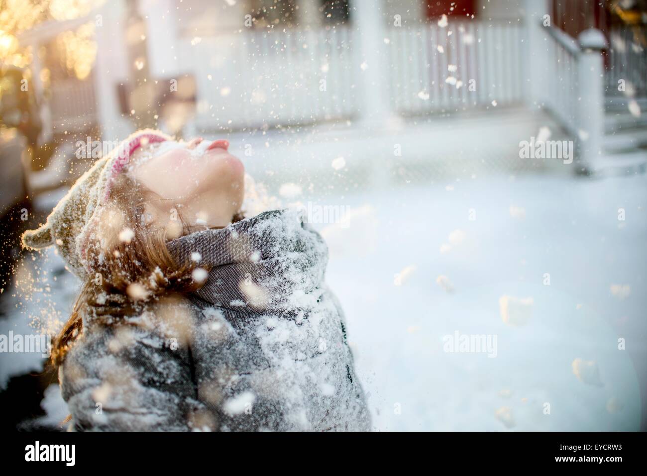 Girl playing with snow Stock Photo
