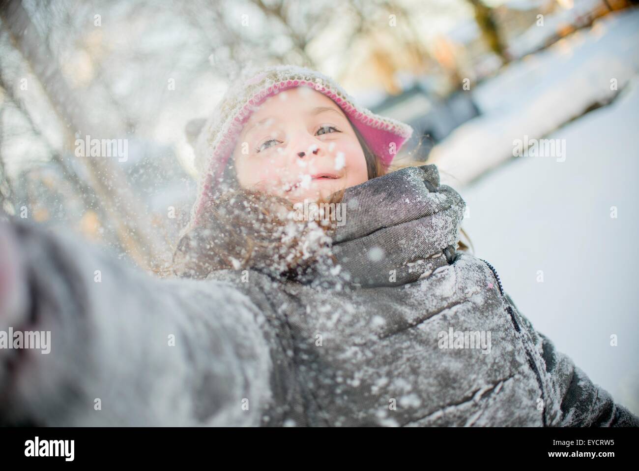 Girl playing with snow Stock Photo