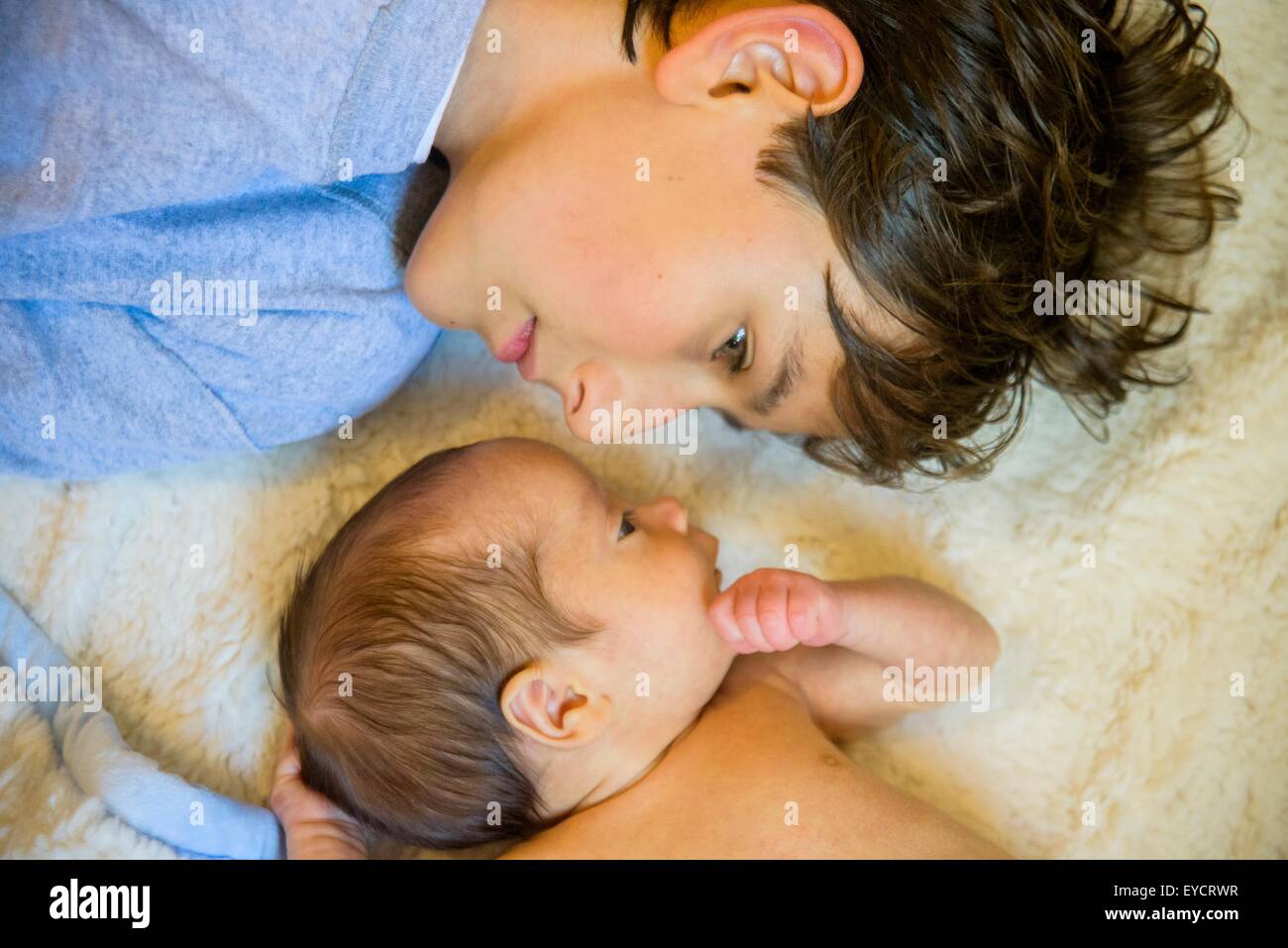 Big brother with baby brother Stock Photo - Alamy