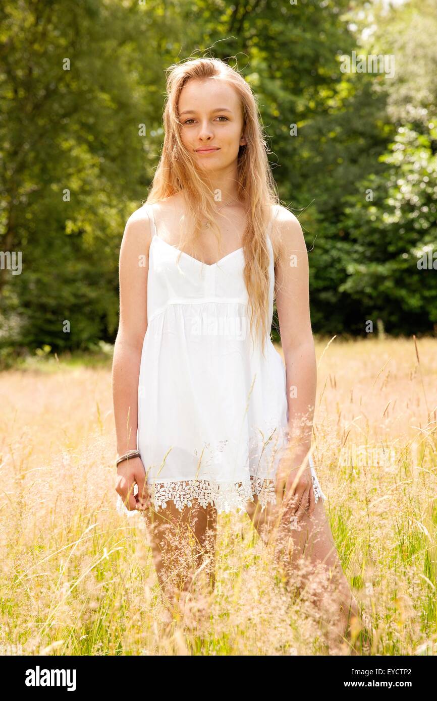 Standing girl hi-res stock photography and images - Alamy