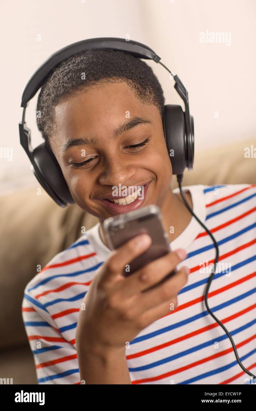 Teenage boy wearing headphones hi res stock photography and images
