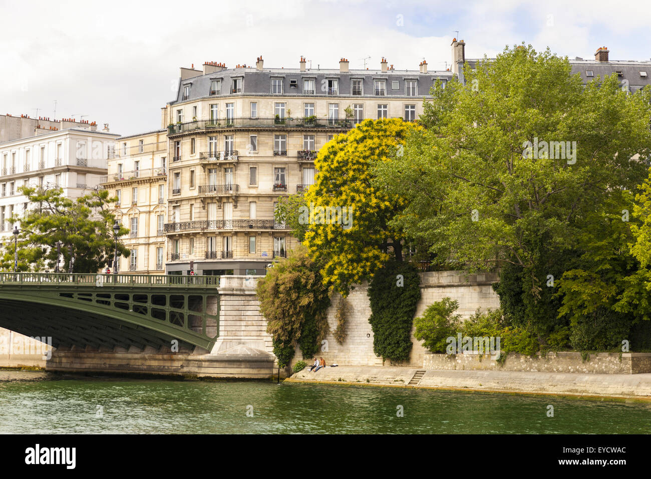 View from the river Seine across Pont de Sully to buildings on the l'Île Saint-Louis, Paris Stock Photo