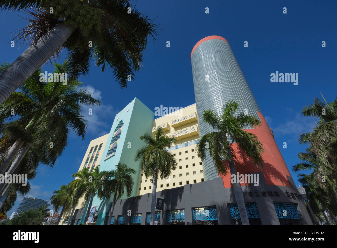 PALM TREES ART DECO STYLE BUILDING WASHINGTON AVENUE SOUTH BEACH MIAMI BEACH FLORIDA USA Stock Photo