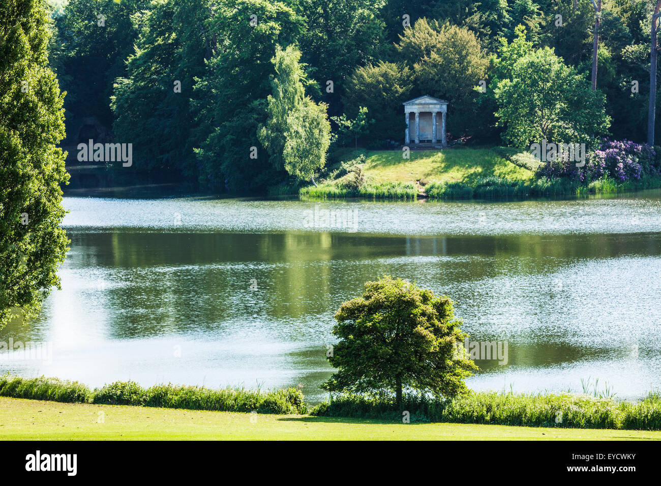 View of the Doric Temple and lake of Bowood House in Wiltshire in the summer. Stock Photo