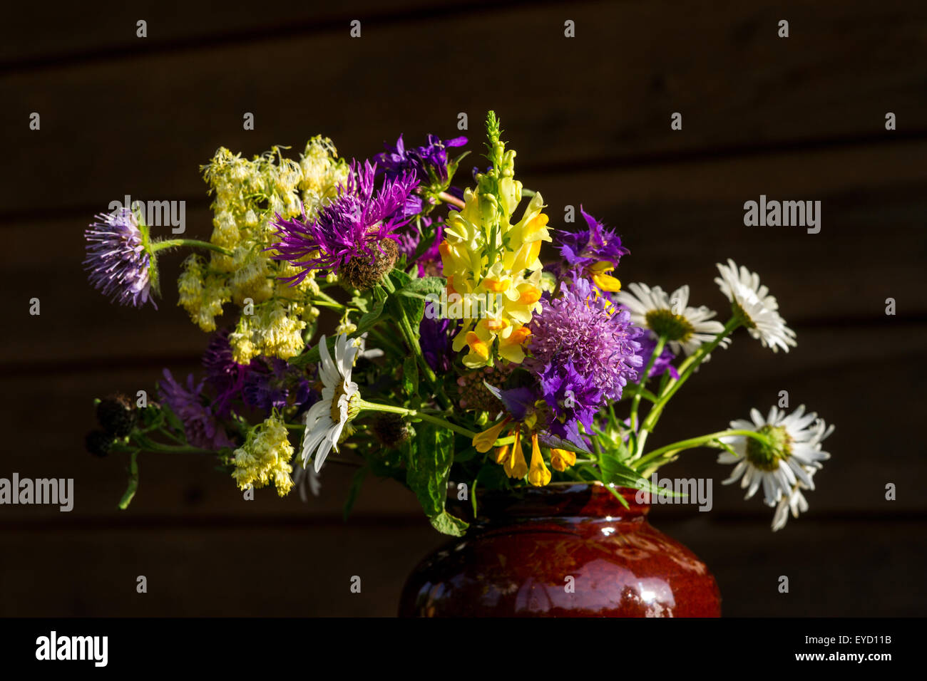A bouquet of wildflowers in a vase Stock Photo - Alamy
