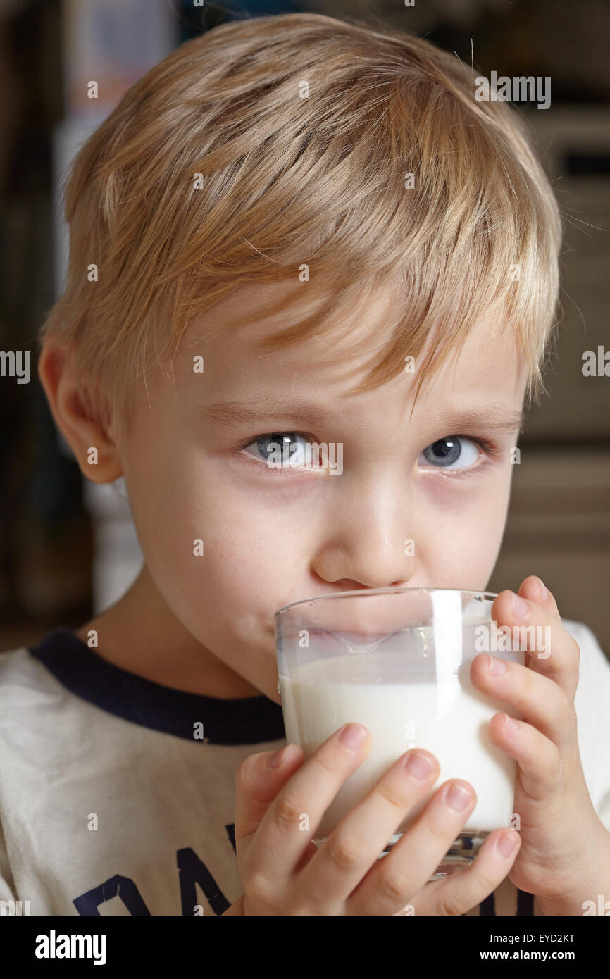 Boy with milk Stock Photo