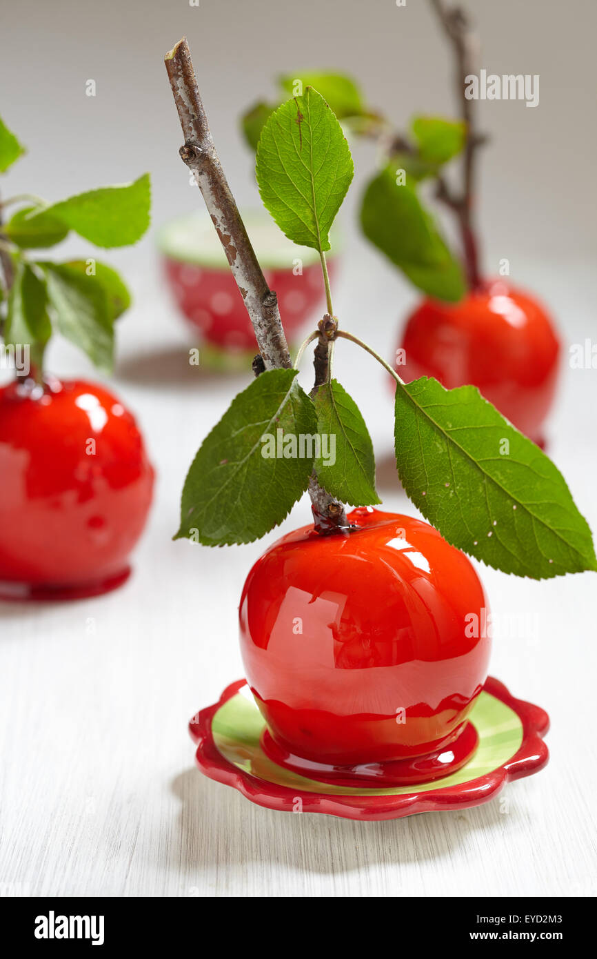 Candied apples on a bunch stick Stock Photo
