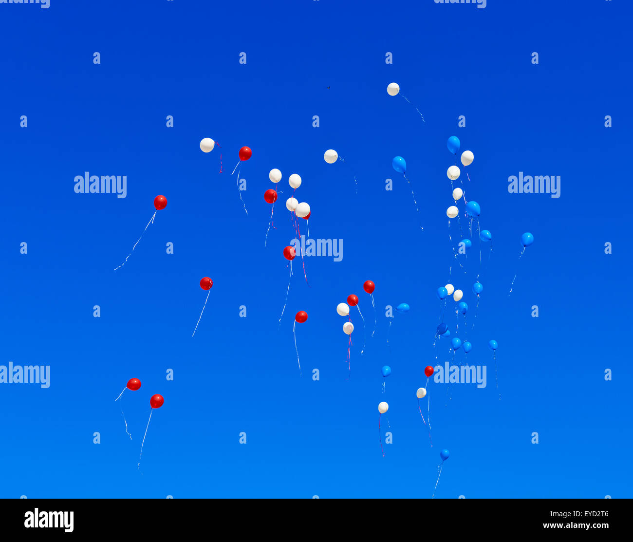 the balloons flying in the blue sky Stock Photo - Alamy