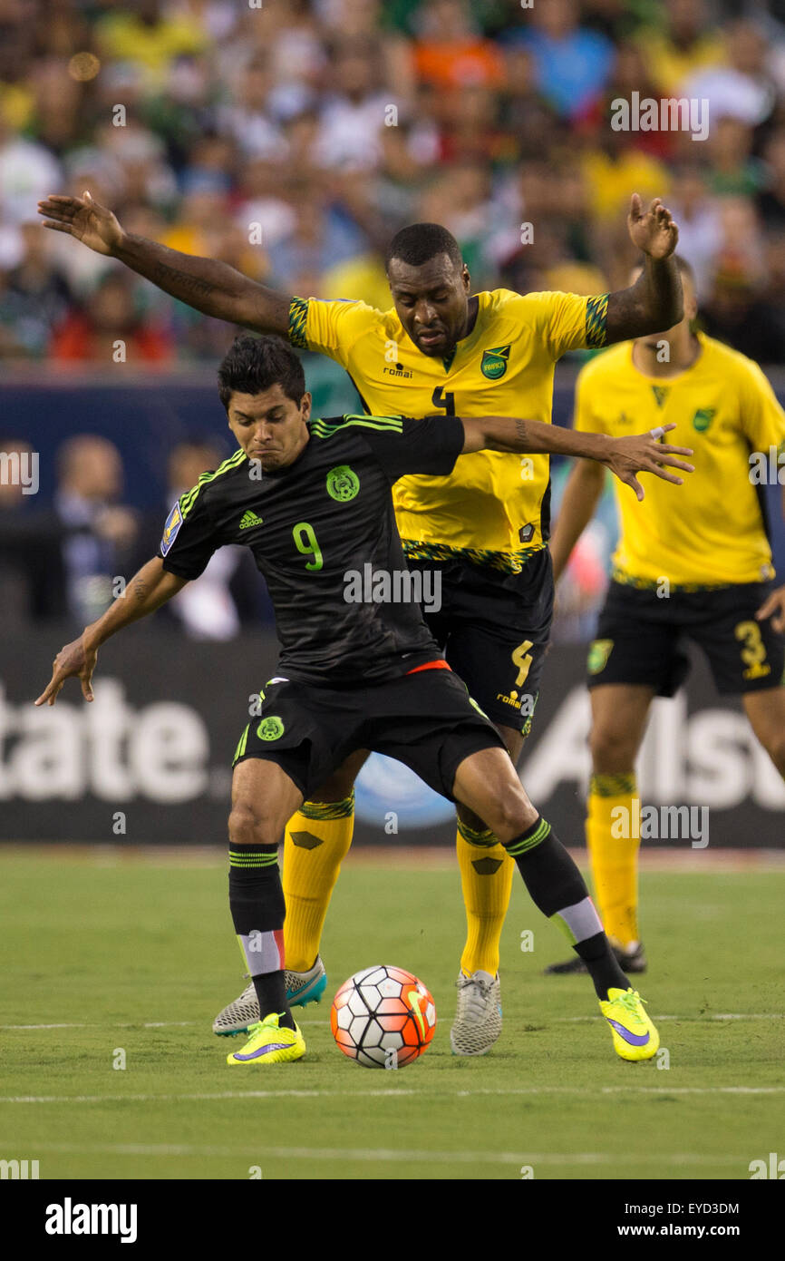 July 26, 2015: Mexico forward Jesus Corona (9) battles with Jamaica defender Wes Morgan (4) for the ball during the CONCACAF Gold Cup 2015 Final match between Jamaica and Mexico at Lincoln Financial Field in Philadelphia, Pennsylvania. Mexico won 3-1. Christopher Szagola/CSM Stock Photo