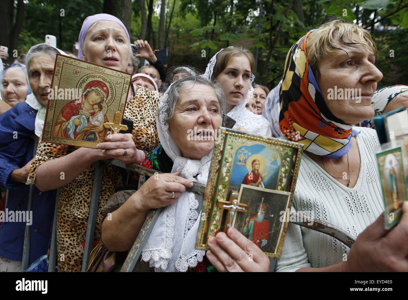 Kiev, Ukraine. 27th July, 2015. Believers from the Ukrainian Orthodox Church of Moscow Patriarchate in a prayer service marking the 1000th anniversary of the Repose of Vladimir the Great at St. Vladimirs Hill in Kiev, Ukraine, 27 July 2015. The Grand Prince of Kiev, Vladimir the Great, also known as St. Vladimir, Vladimir the Baptizer of Rus and Vladimir the Red Sun, was the first Christian ruler in the Kievan Rus who christianized the region. Orthodox believers will mark the 1027th anniversary of Kievan Rus Christianization on 28 July. © Serg Glovny/ZUMA Wire/Alamy Live News Stock Photo