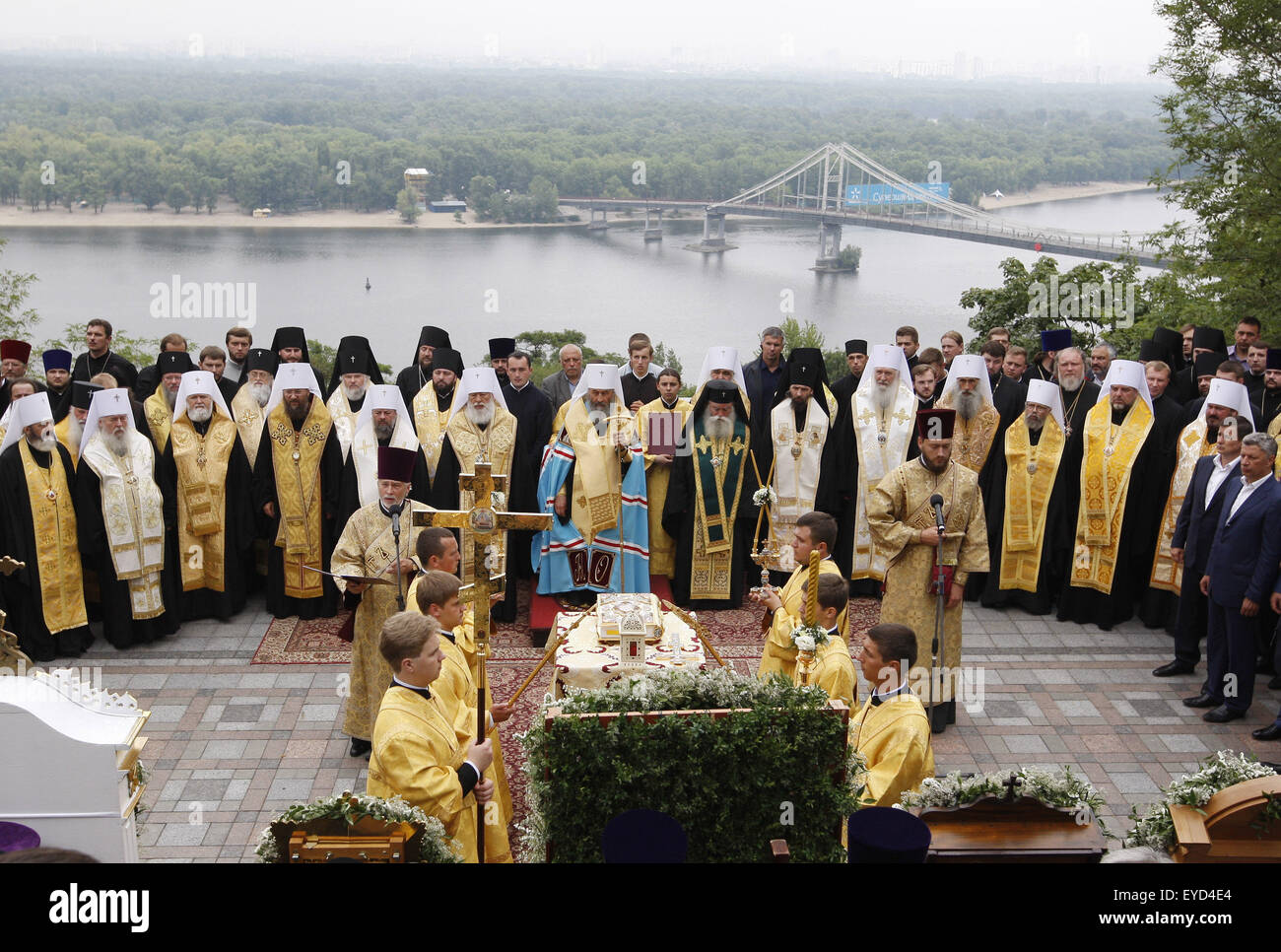 Kiev, Ukraine. 27th July, 2015. Priests from the Ukrainian Orthodox Church of Moscow Patriarchate in a prayer service marking the 1000th anniversary of the Repose of Vladimir the Great at St. Vladimirs Hill in Kiev, Ukraine, 27 July 2015. The Grand Prince of Kiev, Vladimir the Great, also known as St. Vladimir, Vladimir the Baptizer of Rus and Vladimir the Red Sun, was the first Christian ruler in the Kievan Rus who christianized the region. Orthodox believers will mark the 1027th anniversary of Kievan Rus Christianization on 28 July. © Serg Glovny/ZUMA Wire/Alamy Live News Stock Photo