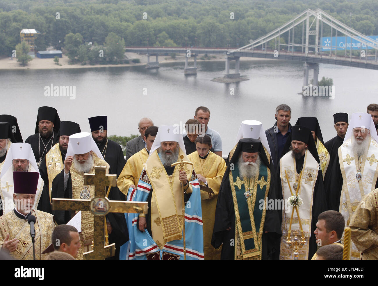 Kiev, Ukraine. 27th July, 2015. Priests from the Ukrainian Orthodox Church of Moscow Patriarchate in a prayer service marking the 1000th anniversary of the Repose of Vladimir the Great at St. Vladimirs Hill in Kiev, Ukraine, 27 July 2015. The Grand Prince of Kiev, Vladimir the Great, also known as St. Vladimir, Vladimir the Baptizer of Rus and Vladimir the Red Sun, was the first Christian ruler in the Kievan Rus who christianized the region. Orthodox believers will mark the 1027th anniversary of Kievan Rus Christianization on 28 July. © Serg Glovny/ZUMA Wire/Alamy Live News Stock Photo