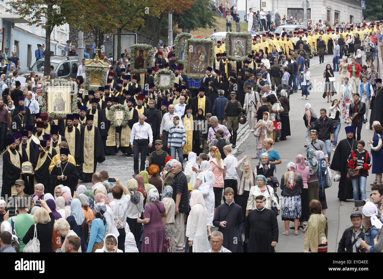 July 27, 2015 - Kiev, Ukraine - Priests from the Ukrainian Orthodox Church of Moscow Patriarchate carry icons as they march during an event marking the 1000th anniversary of the Repose of Vladimir the Great at St. Vladimirs Hill in Kiev, Ukraine, 27 July 2015. The Grand Prince of Kiev, Vladimir the Great, also known as St. Vladimir, Vladimir the Baptizer of Rus and Vladimir the Red Sun, was the first Christian ruler in the Kievan Rus who christianized the region. Orthodox believers will mark the 1027th anniversary of Kievan Rus Christianization on 28 July. (Credit Image: © Serg Glovny via ZUMA Stock Photo