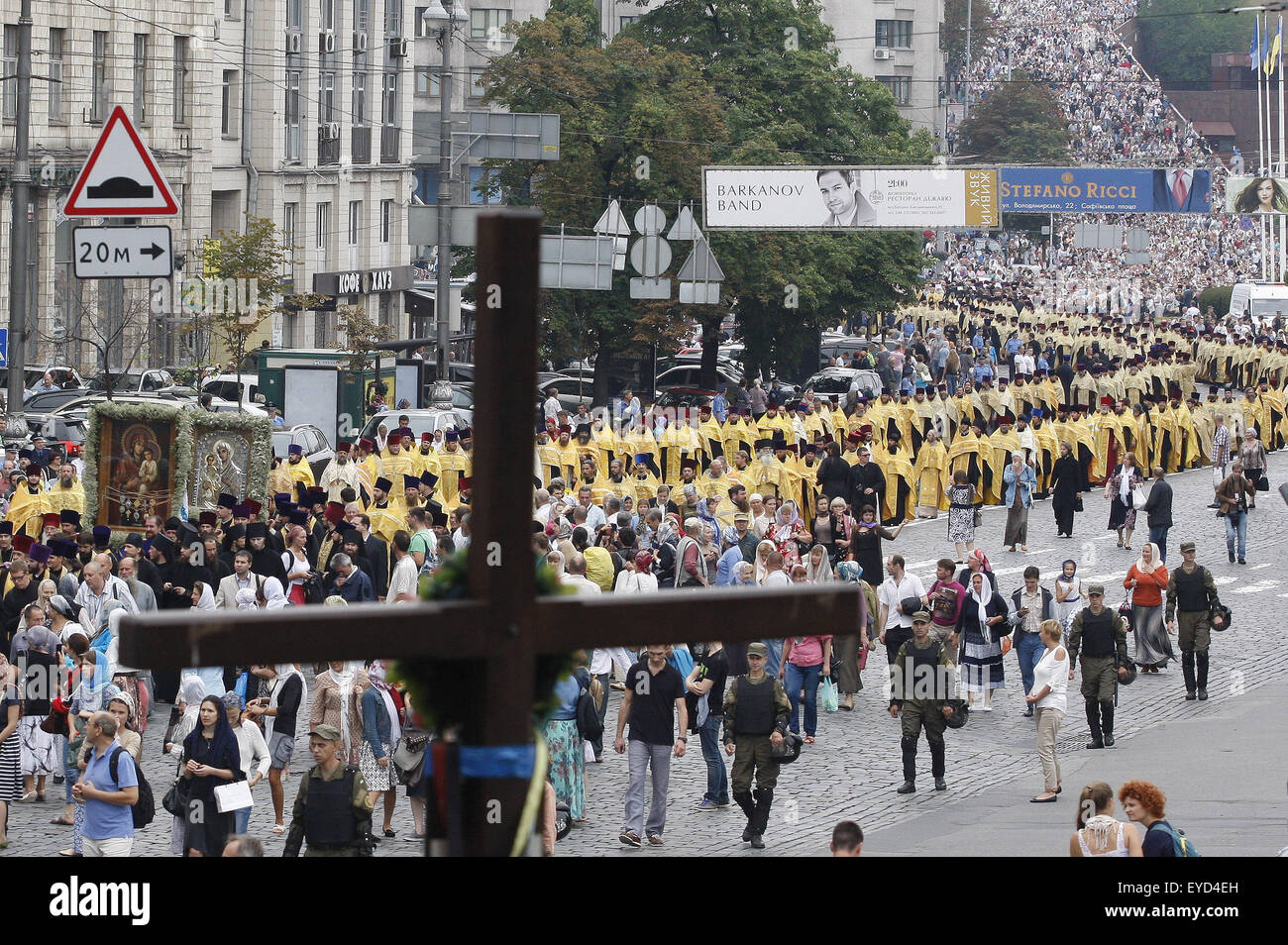 Kiev, Ukraine. 27th July, 2015. Believers and priests from the Ukrainian Orthodox Church of Moscow Patriarchate take a part in religious procession marking the 1000th anniversary of the Repose of Vladimir the Great at St. Vladimirs Hill in Kiev, Ukraine, 27 July 2015. The Grand Prince of Kiev, Vladimir the Great, also known as St. Vladimir, Vladimir the Baptizer of Rus and Vladimir the Red Sun, was the first Christian ruler in the Kievan Rus who christianized the region. Orthodox believers will mark the 1027th anniversary of Kievan Rus Christianization on 28 July. (Credit Image: © Serg Glovny Stock Photo