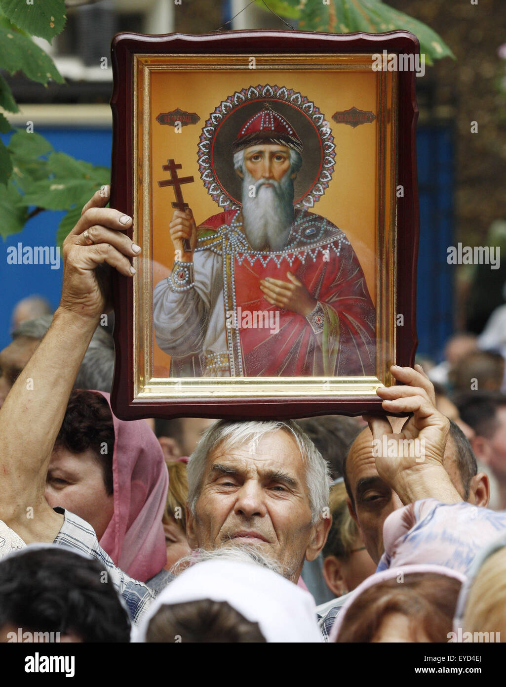 Kiev, Ukraine. 27th July, 2015. Believer take a part in a prayer service marking the 1000th anniversary of the Repose of Vladimir the Great at St. Vladimirs Hill in Kiev, Ukraine, 27 July 2015. The Grand Prince of Kiev, Vladimir the Great, also known as St. Vladimir, Vladimir the Baptizer of Rus and Vladimir the Red Sun, was the first Christian ruler in the Kievan Rus who christianized the region. Orthodox believers will mark the 1027th anniversary of Kievan Rus Christianization on 28 July. © Serg Glovny/ZUMA Wire/Alamy Live News Stock Photo