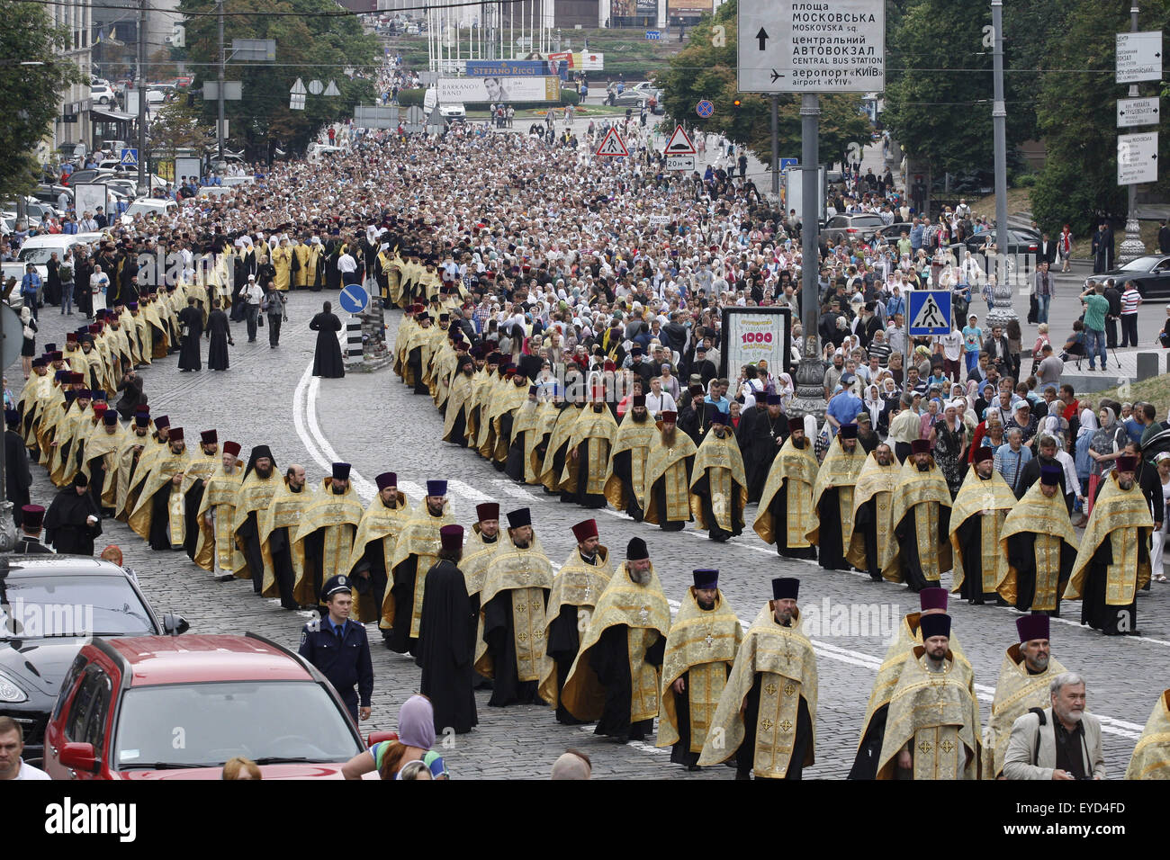 Kiev, Ukraine. 27th July, 2015. Believers and priests from the Ukrainian Orthodox Church of Moscow Patriarchate take a part in religious procession marking the 1000th anniversary of the Repose of Vladimir the Great at St. Vladimirs Hill in Kiev, Ukraine, 27 July 2015. The Grand Prince of Kiev, Vladimir the Great, also known as St. Vladimir, Vladimir the Baptizer of Rus and Vladimir the Red Sun, was the first Christian ruler in the Kievan Rus who christianized the region. Orthodox believers will mark the 1027th anniversary of Kievan Rus Christianization on 28 July. (Credit Image: © Serg Glovny Stock Photo
