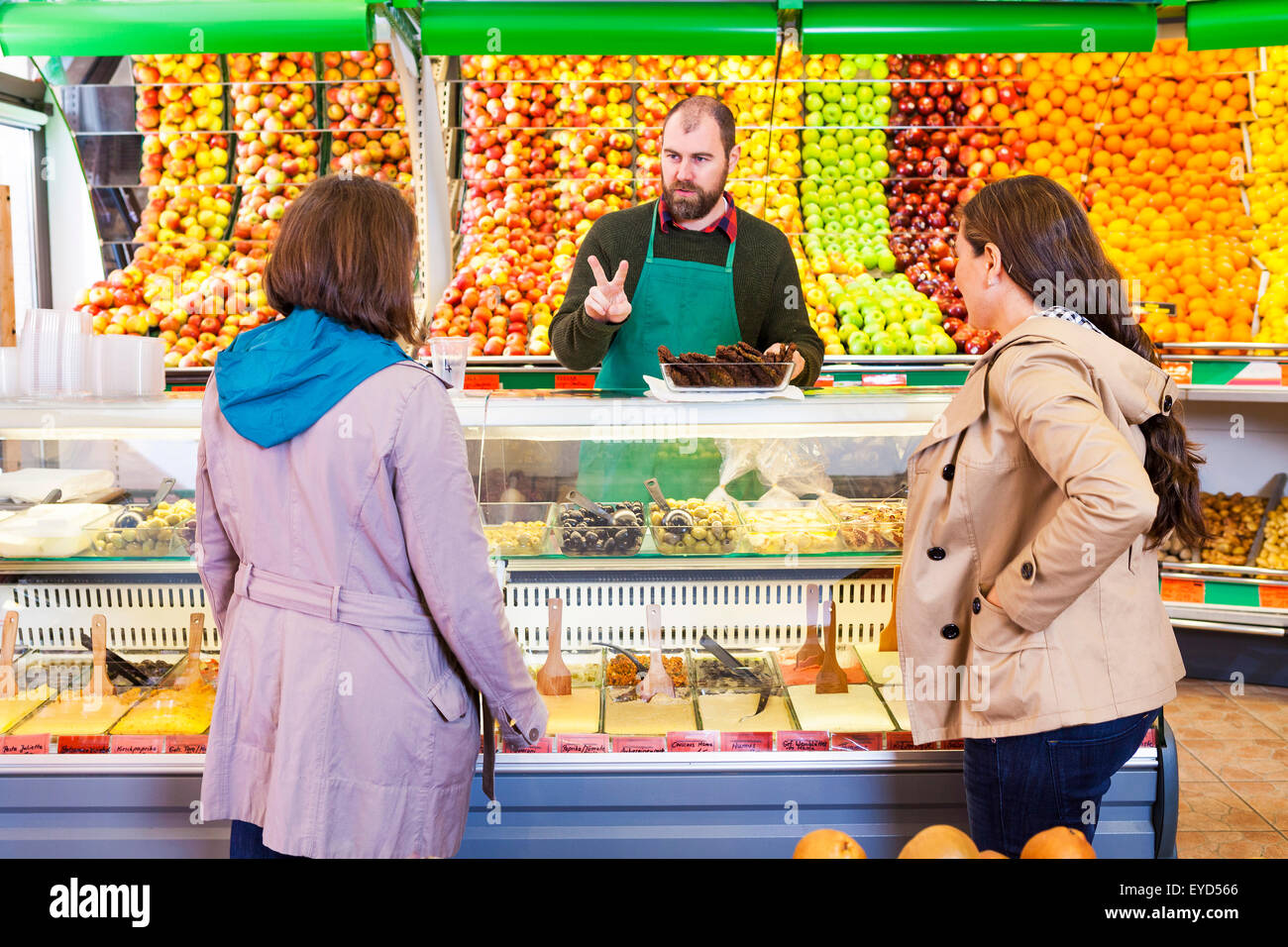 Female customers shopping in greengrocer's shop Stock Photo