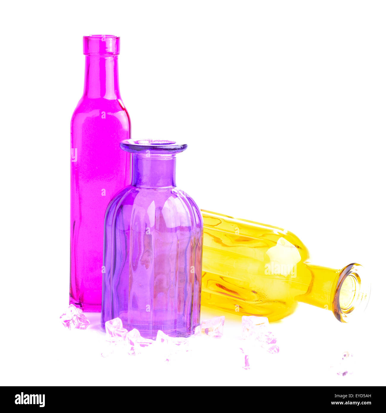 Three colorful bottles, isolated on white background Stock Photo