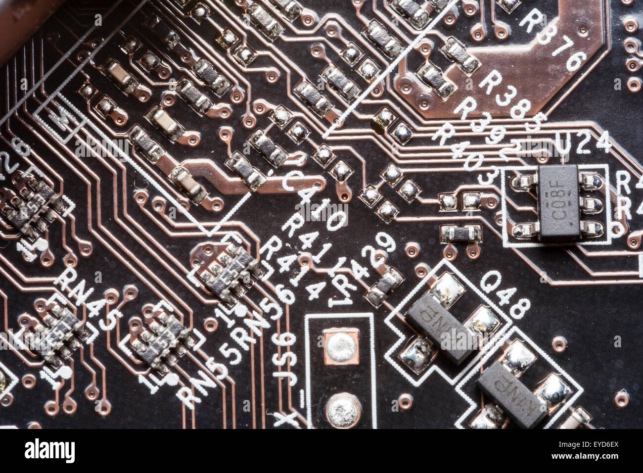 MSI Intel home computer motherboard Close up of electronic circuit board with various circuits and labels. Stock Photo