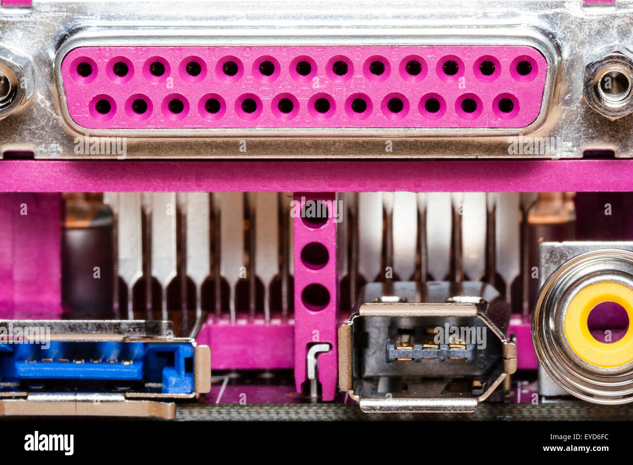 Intel computer Motherboard socket panel at back. Parallel port for monitors output, colour coded pink. Firewire port below. Stock Photo