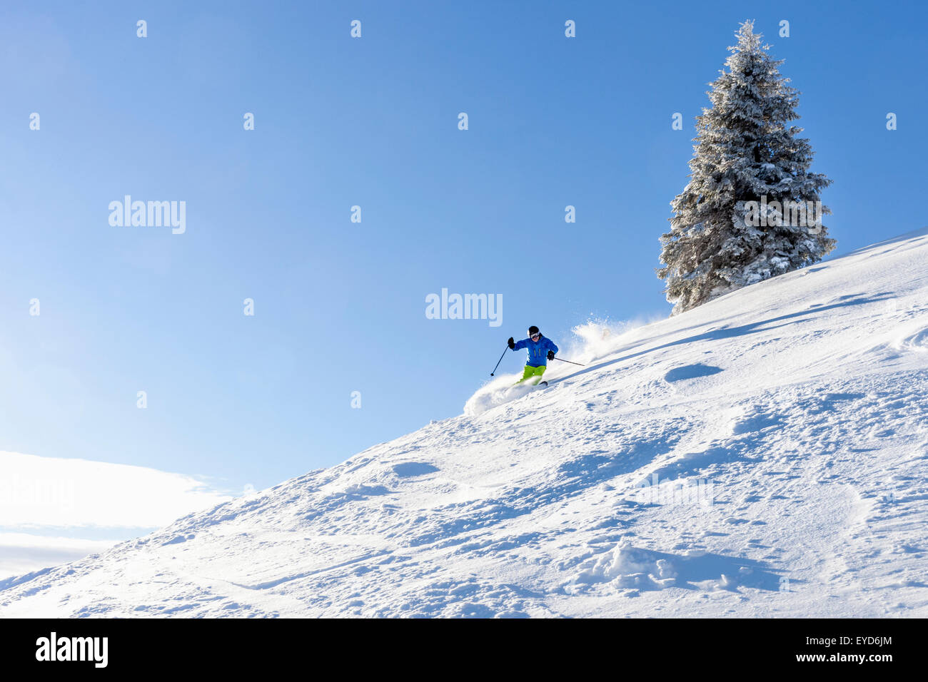 Ski holiday, Man skiing downhill, Sudelfeld, Bavaria, Germany Stock Photo