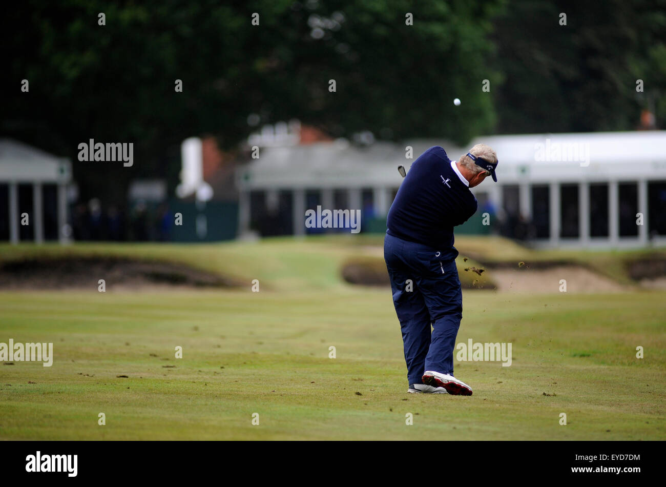 Sunningdale, UK. 26th July, 2015. Colin Montgomery of Scotland plays his approach shot to the final hole on his way to shooting a final round 67 for 3rd place in The Senior Open Championship at Sunningdale Golf Club on July 26, 2015 in Sunningdale, England. Credit:  David Partridge/Alamy Live News Stock Photo