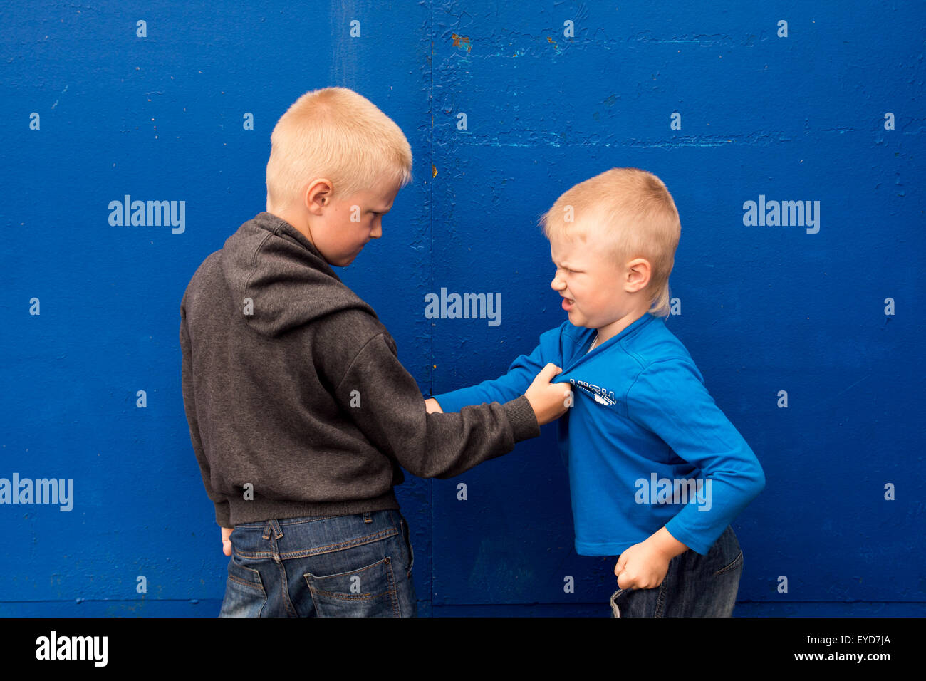 children fight between two angry aggressive brothers (kids, boys) Stock Photo