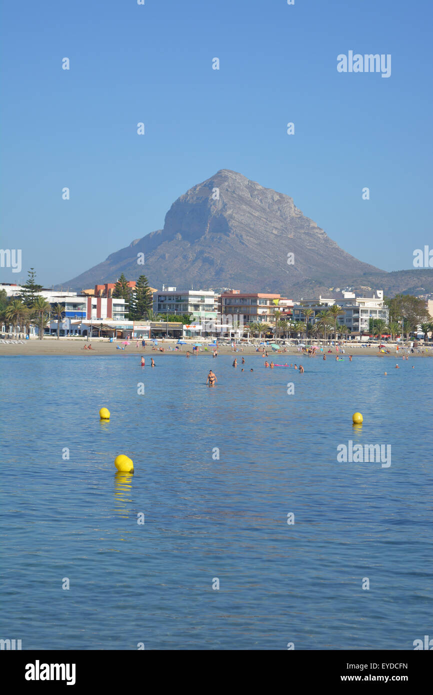Early morning view over the bay towards Arenal beach area with Montgo in the background, Javea, Alicante, Spain. Stock Photo