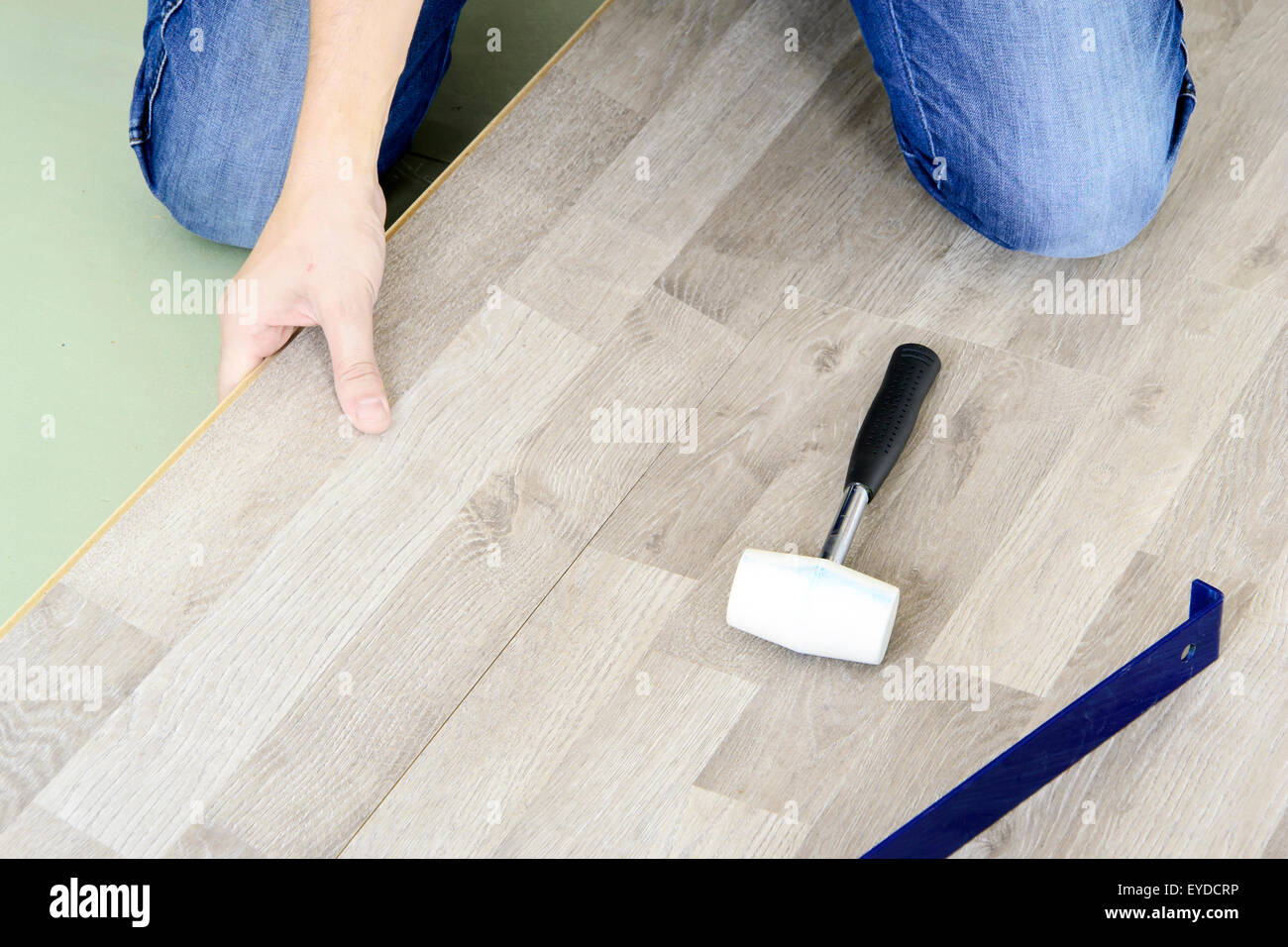 Man With Tools To Laying Laminate Stock Photo 85732634 Alamy