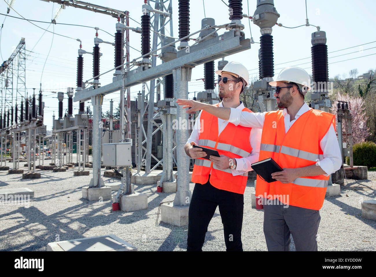 Engineers checking electricity substation Stock Photo - Alamy