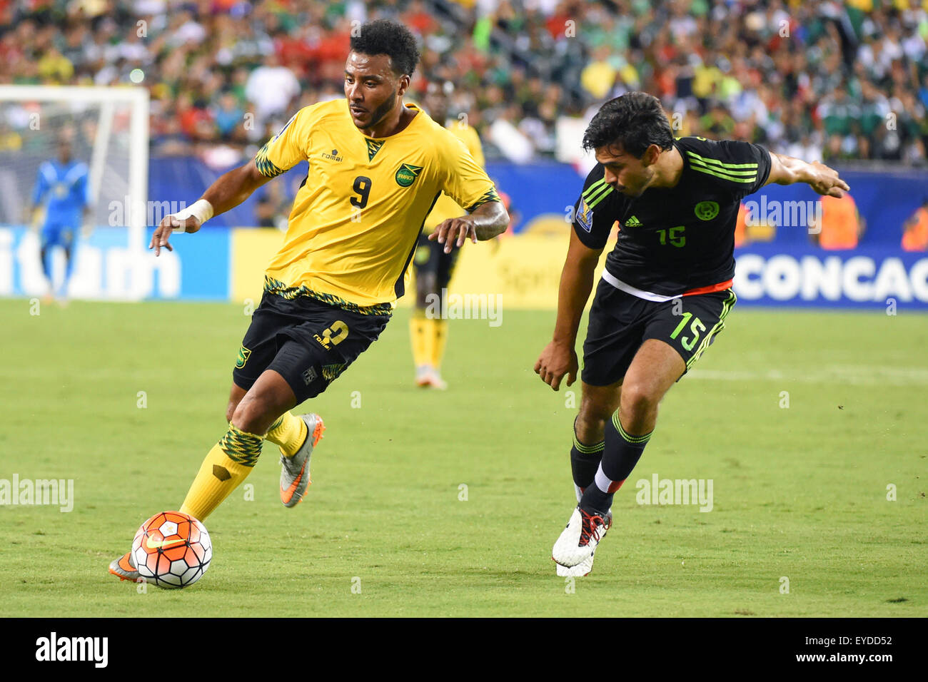 Philadelphia, Pennsylvania, USA. 26th July, 2015. Jamaica forward Giles Barnes #9 controls the ball against the defense of Mexico defender Hector Moreno #15 during the 2015 CONCACAF Gold Cup final between Jamaica and Mexico at Lincoln Financial Field in Philadelphia, Pennsylvania. Mexico defeated Jamaica 3-1. Rich Barnes/CSM/Alamy Live News Stock Photo