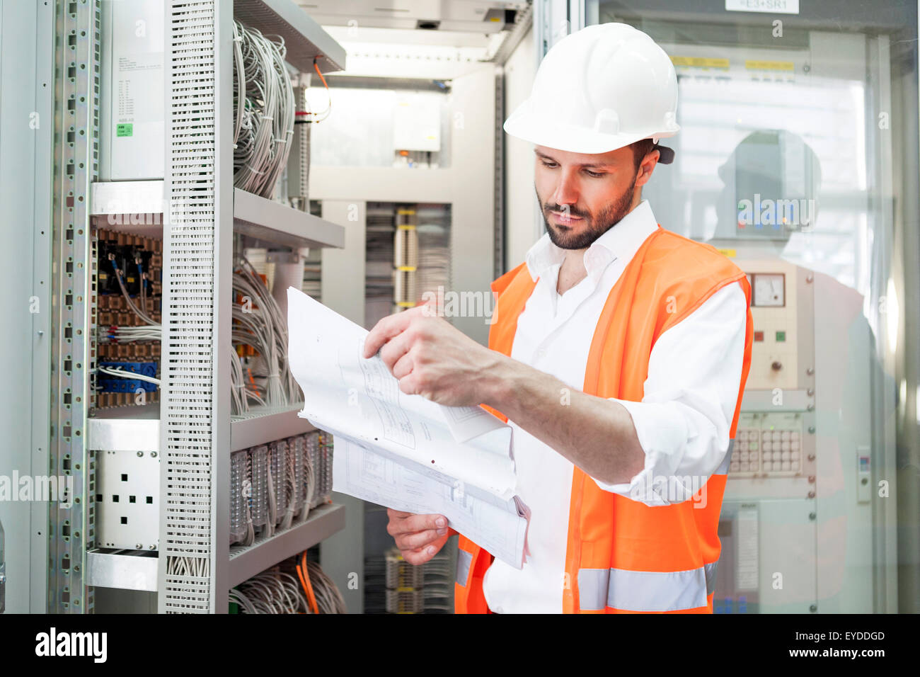Engineer checking electricity substation Stock Photo
