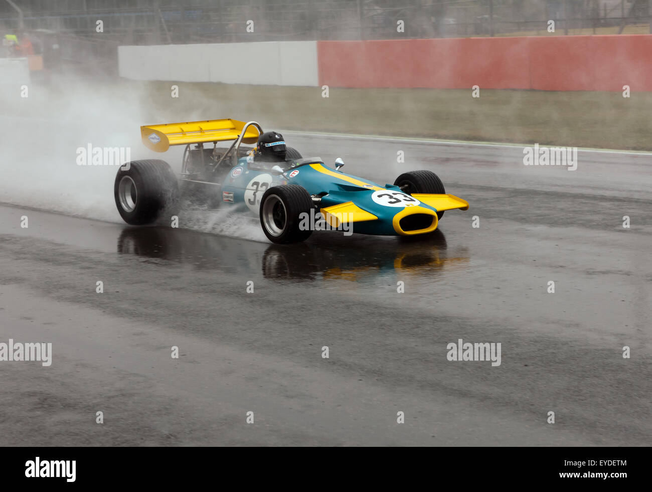 Duncan Dayton drives a 1971, Brabham BT33, in heavy rain, during a qualifying session for the FIA Master's Historic Formula One Race Stock Photo