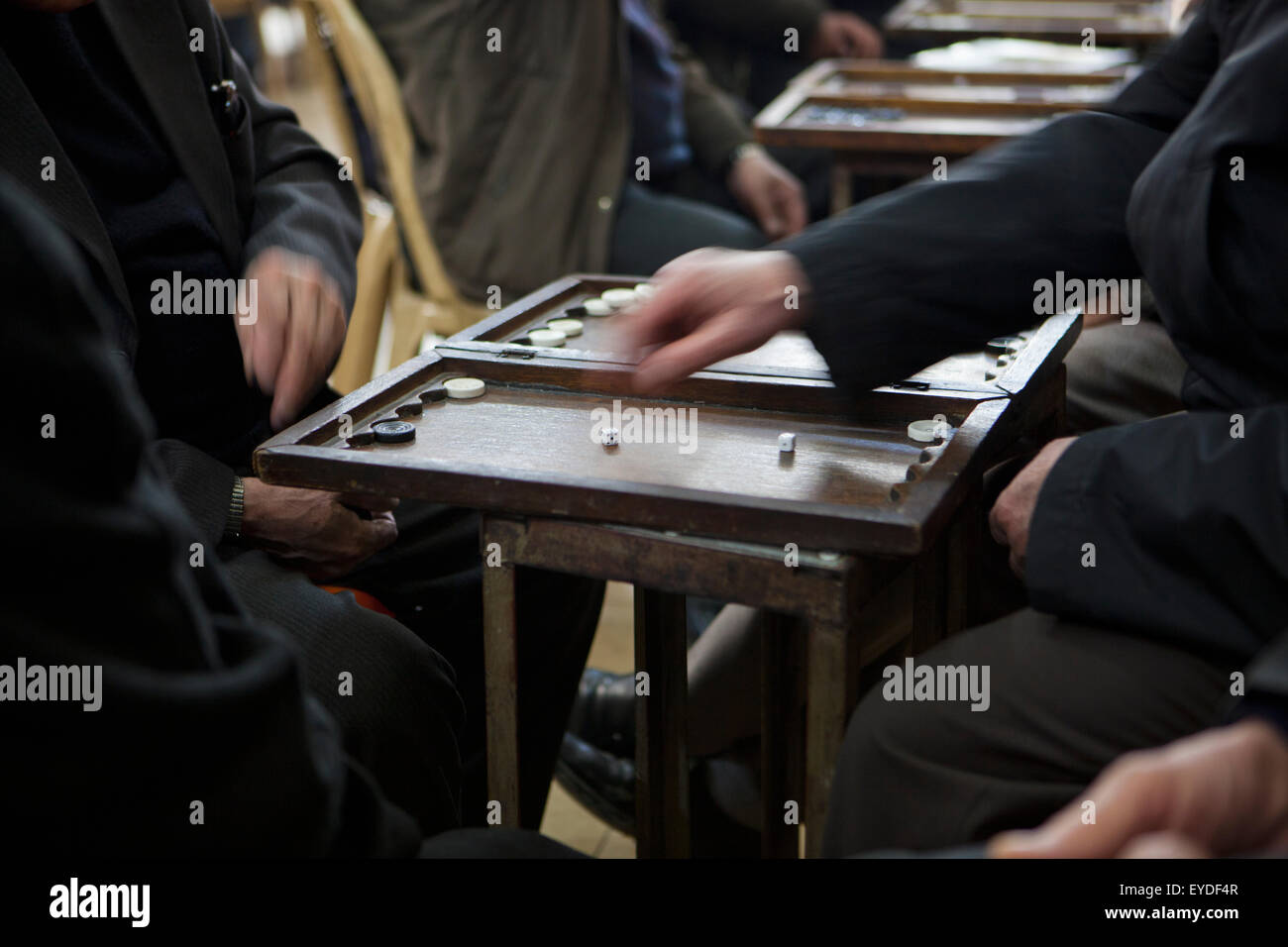 Men Playing Backgammon Game In The Sha'ab Chai Khana [Teahouse], Sulaymaniyah, Iraqi Kurdistan, Iraq Stock Photo