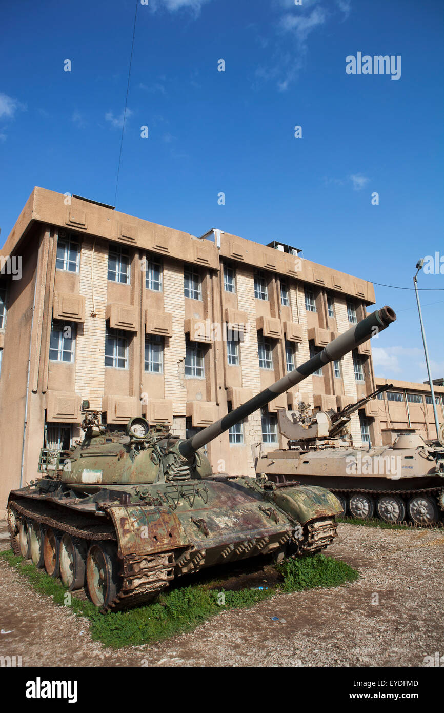 Tank In Front Of The Amna Suraka (Red Security) Museum, Iraqi Kurdistan, Iraq Stock Photo