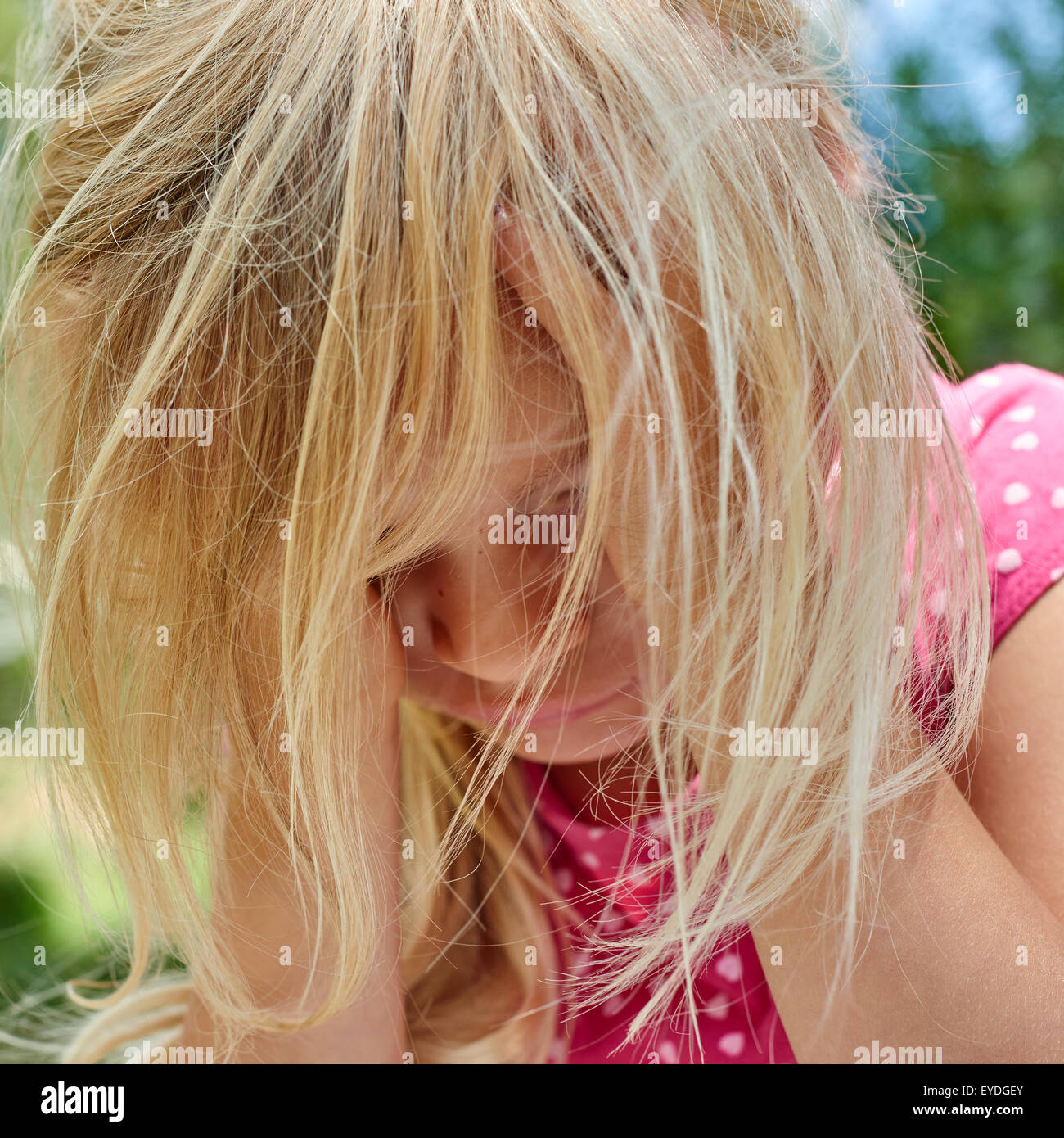Alone Sad child little girl, summer, outside, portrait Stock Photo