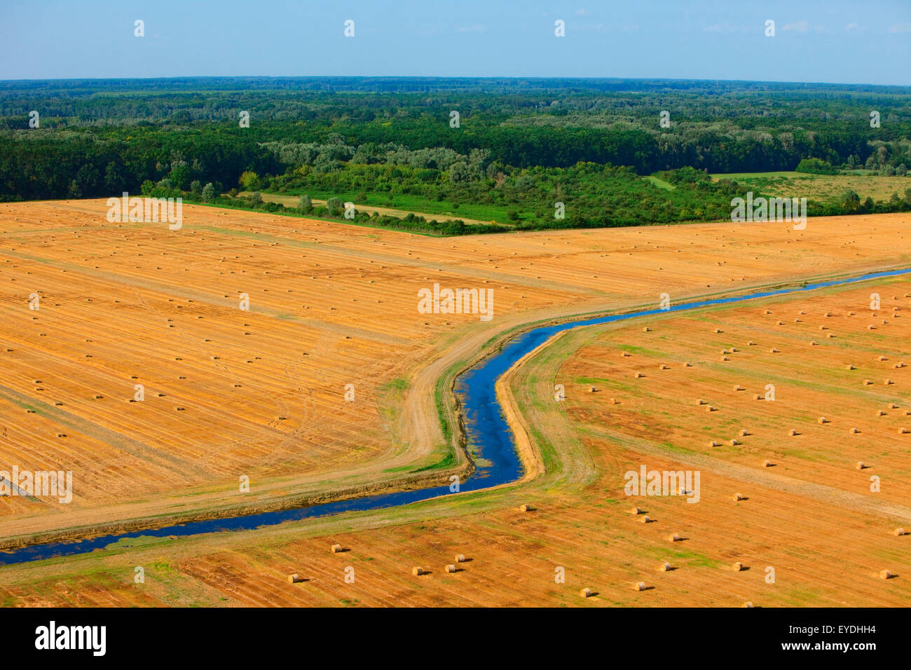 Aerial view of plowed fields with hay bales, Slavonia, Croatia Stock Photo