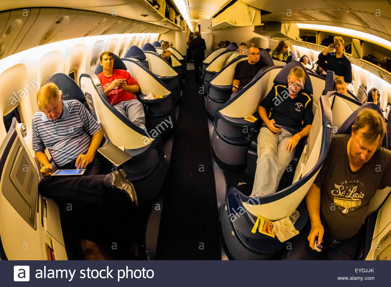 Passengers In The Business Elite Cabin Aboard A Delta Airlines