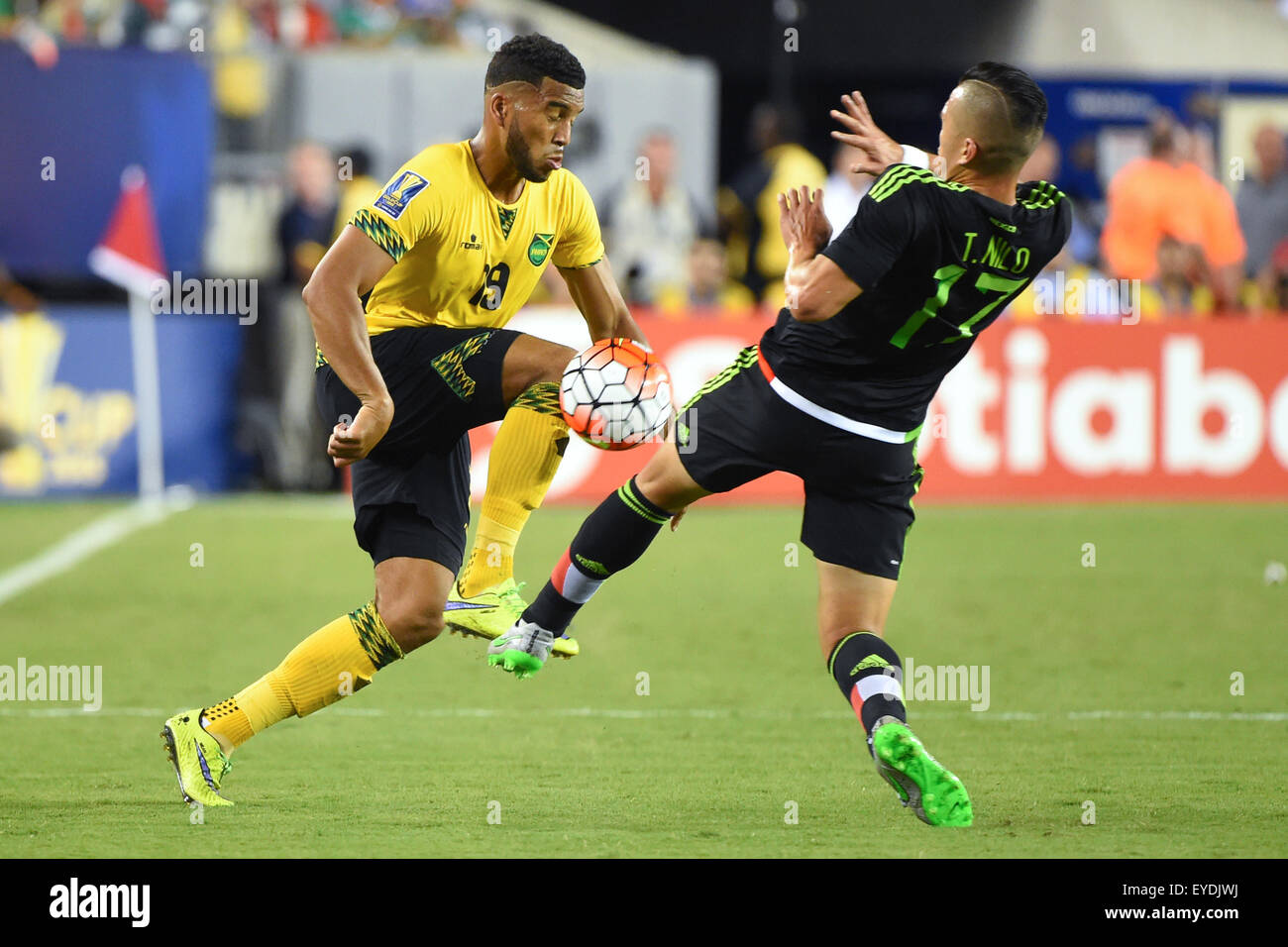 Philadelphia, Pennsylvania, USA. 26th July, 2015. Jamaica defender Adrian Mariappa #19 and Mexico midfielder Jorge Torres Nilo #17 battle for a loose ball during the 2015 CONCACAF Gold Cup final between Jamaica and Mexico at Lincoln Financial Field in Philadelphia, Pennsylvania. Mexico defeated Jamaica 3-1. Rich Barnes/CSM/Alamy Live News Stock Photo