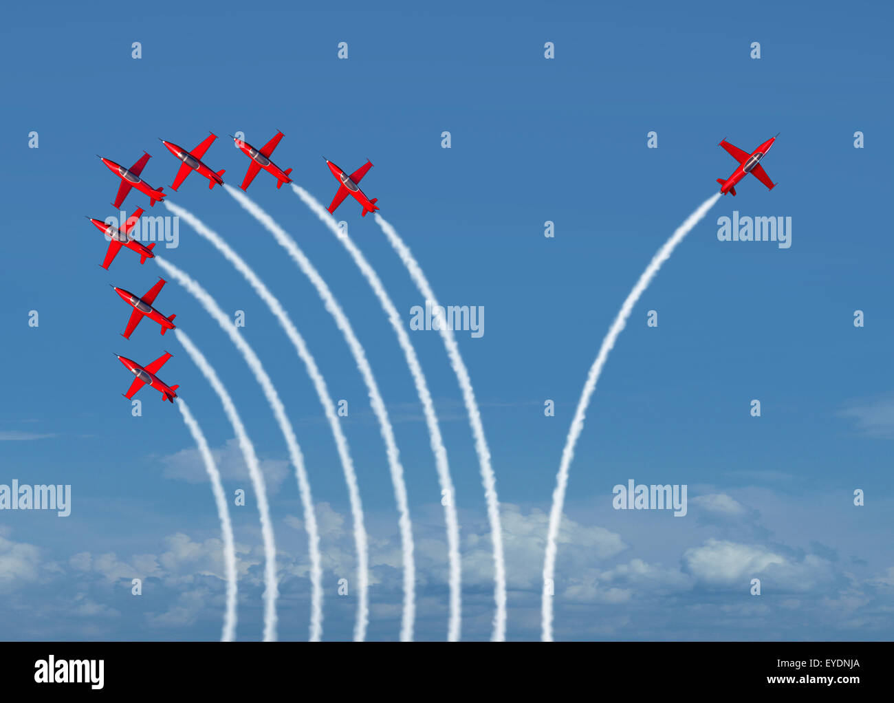 Independent innovation and new thinking concept or leadership symbol of individuality as a group of flying jet airplanes with one individual airplane going in the opposite direction as a business icon for innovative thinker. Stock Photo