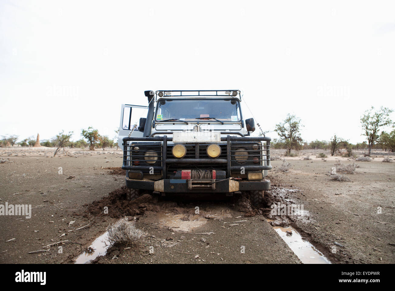 Kenya, Front view of Landrover in mud; North Turkana Stock Photo