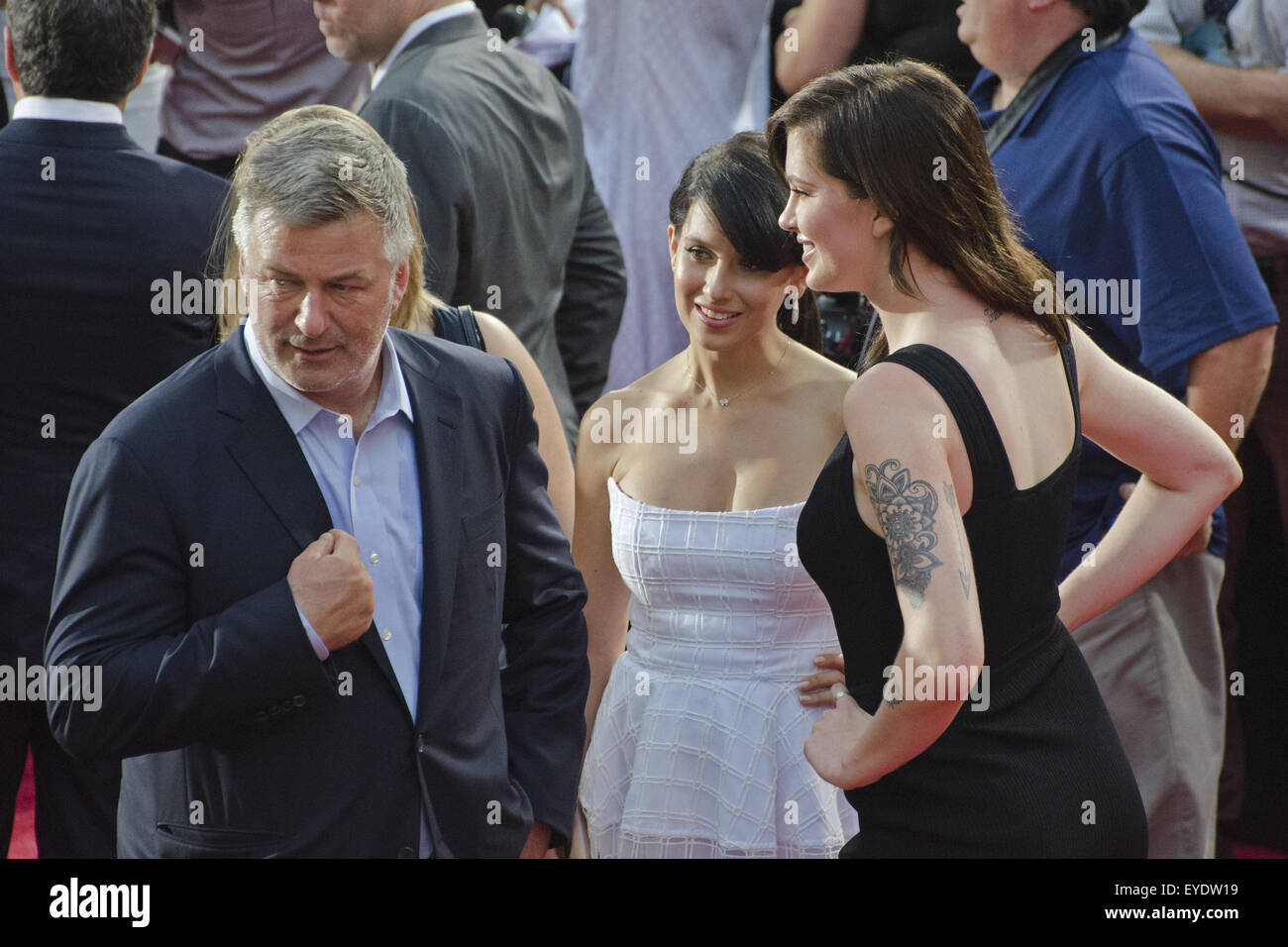 New York, USA. 27th July, 2015. Alec Baldwinm, his eldest daughter19-year-old model Ireland and Bonita mama posing for a photo during Mission Impossible: Rogue Nation Premiere in NYC at Times Square, New York City. Credit:  Sumit Shrestha/ZUMA Wire/Alamy Live News Stock Photo