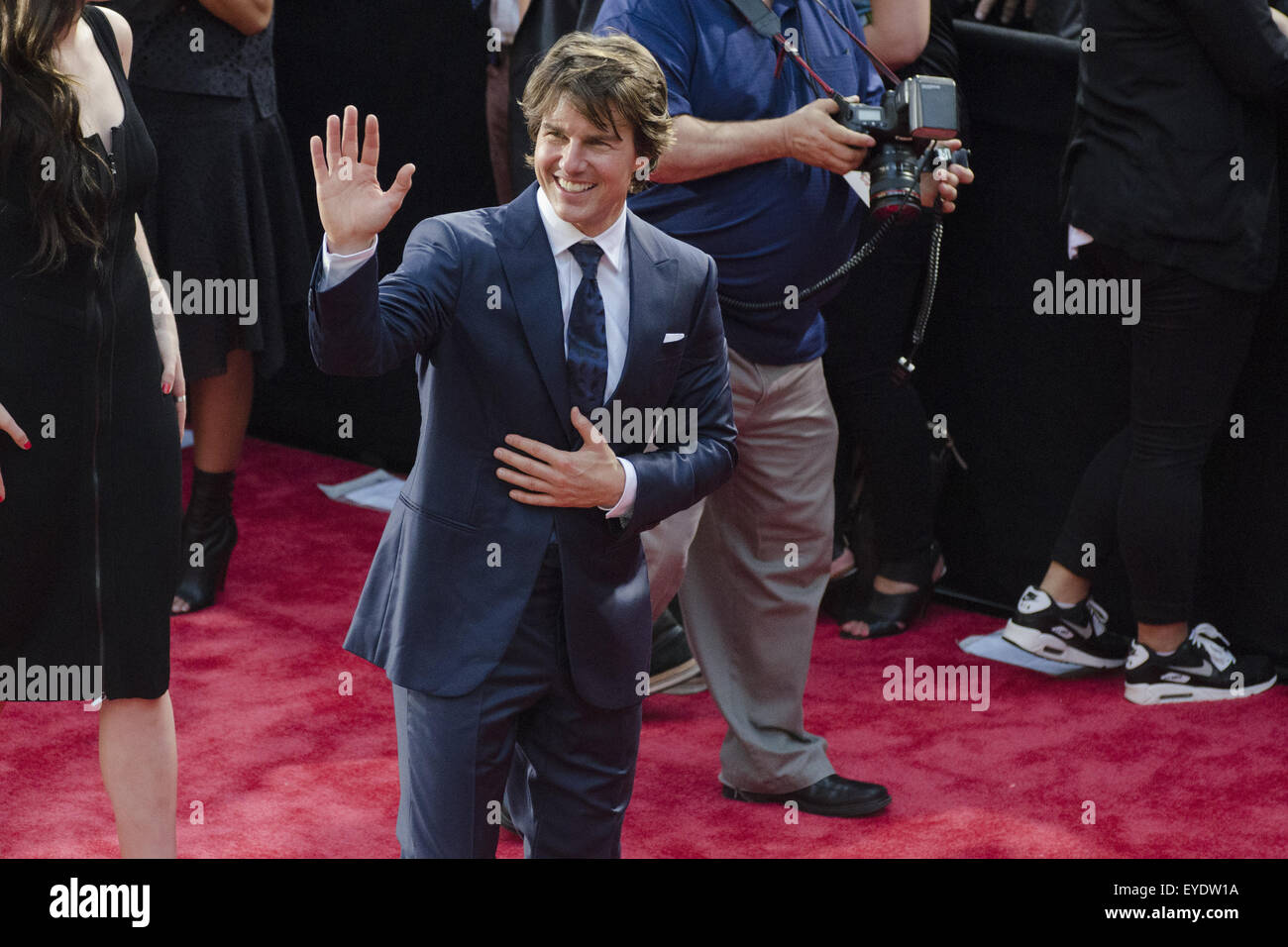 New York, USA. 27th July, 2015. Tom Cruise waves at the fans during Mission Impossible: Rogue Nation Premiere in NYC at Times Square, New York City. Credit:  Sumit Shrestha/ZUMA Wire/Alamy Live News Stock Photo
