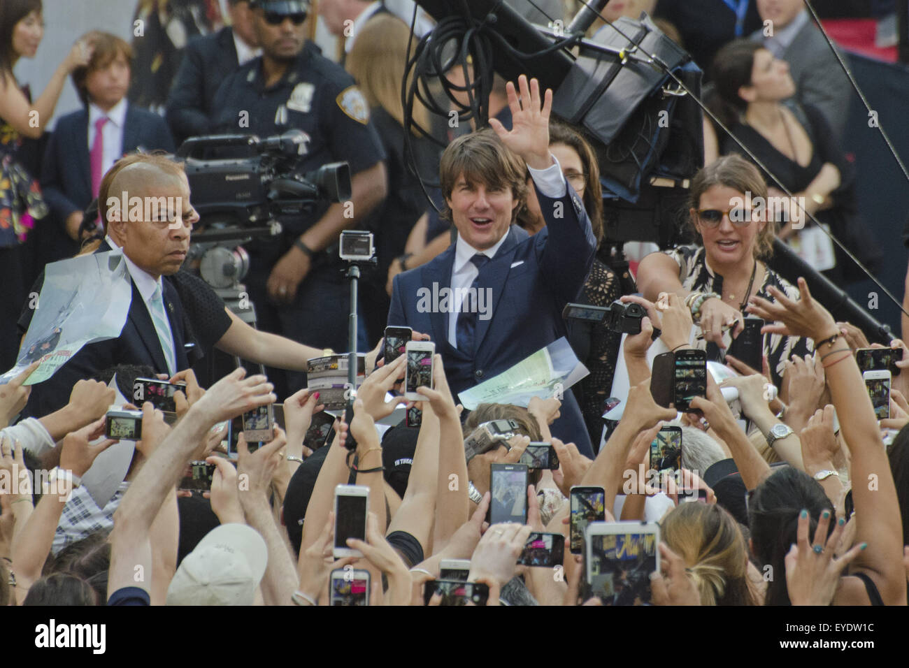 New York, USA. 27th July, 2015. Tom Cruise waves at the fans during Mission Impossible: Rogue Nation Premiere in NYC at Times Square, New York City. Credit:  Sumit Shrestha/ZUMA Wire/Alamy Live News Stock Photo